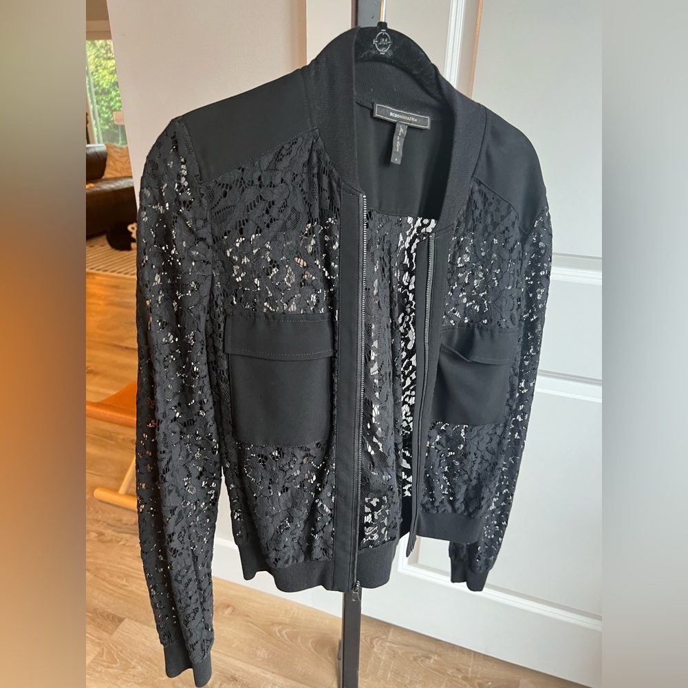 BCBG lace jacket size small.  Great with jeans and a tshirt or dressed up.